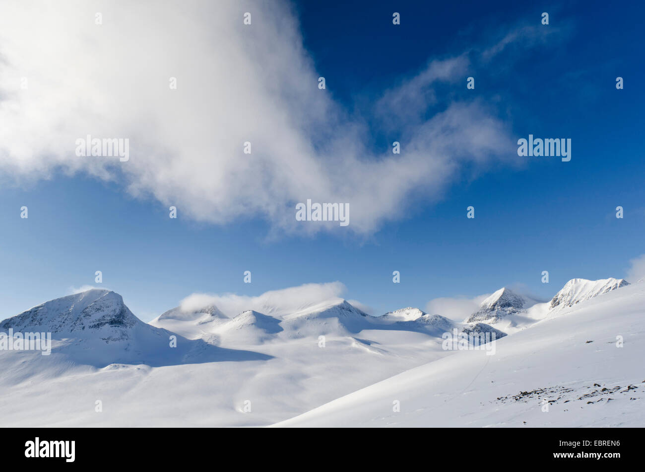 snowy mountains of Tjaektjatjokka in Stuor Reaiddßvßggi, Sweden, Lapland, Norrbotten, Kebnekaisefjaell Stock Photo