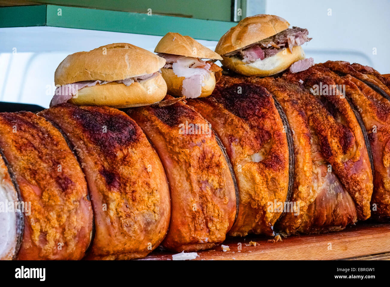 take away with the pork speciality Porchetta at the weekly market in Sienna, Italy, Tuscany Stock Photo