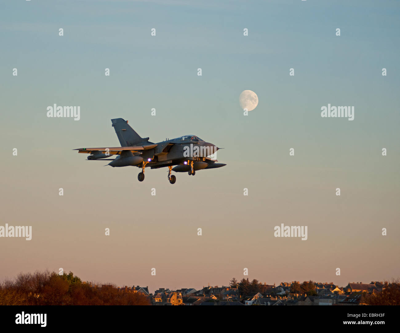 An RAF GR4 Tornado aircraft makes an early evening retrurn to RAF Lossiemouth, Morayshire.  SCO 9281. Stock Photo