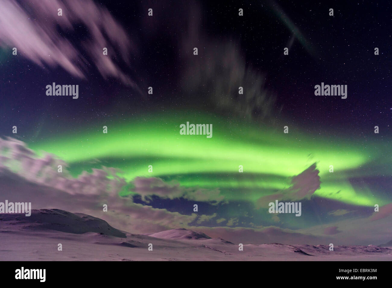 Aurora borealis over mountains at Weitwa in moonlight, Sweden, Lapland Stock Photo