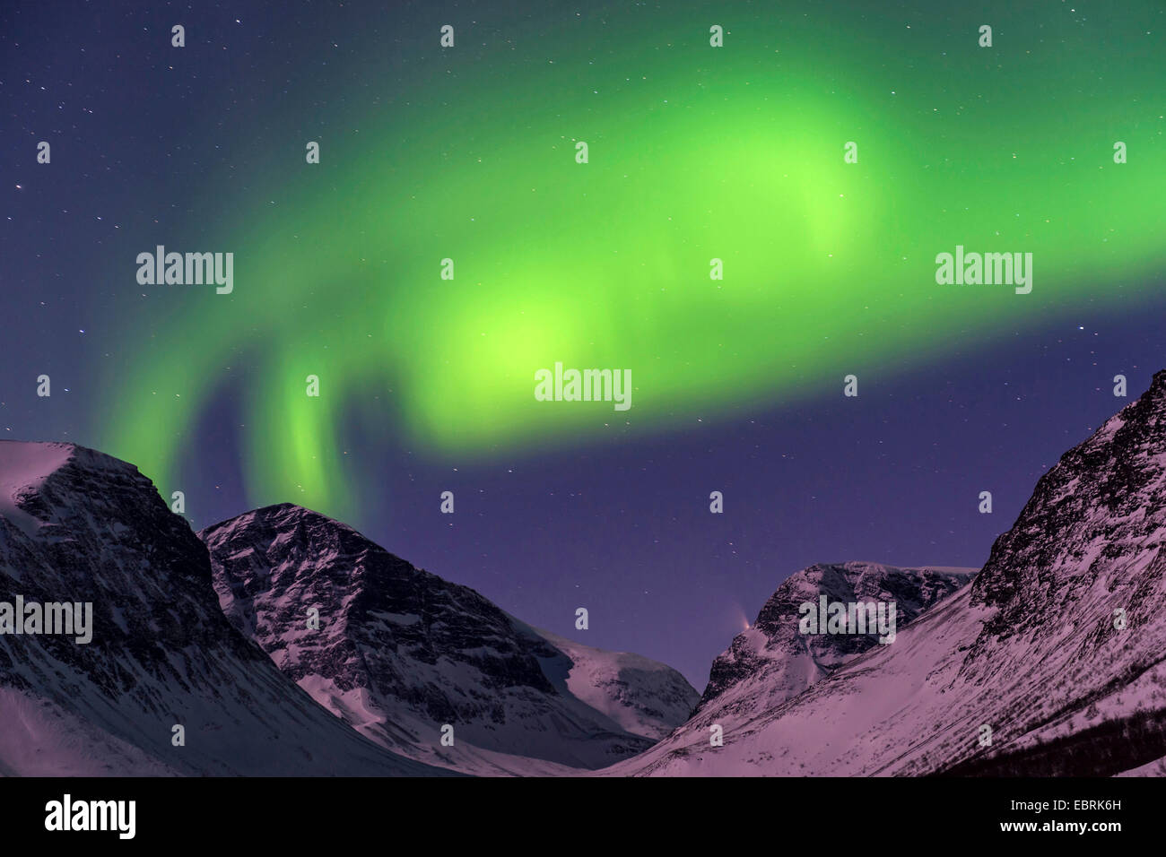 Aurora borealis over mountains in Vistasdalen in moonlight, Sweden, Lapland, Kebnekaisefjaell Stock Photo