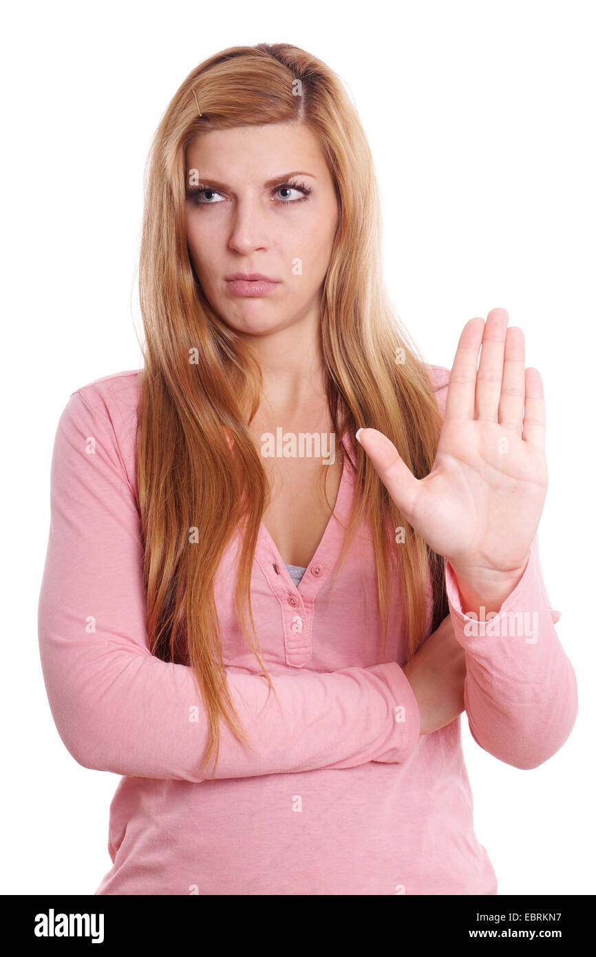 displeased young woman making stop gesture with her hand Stock Photo