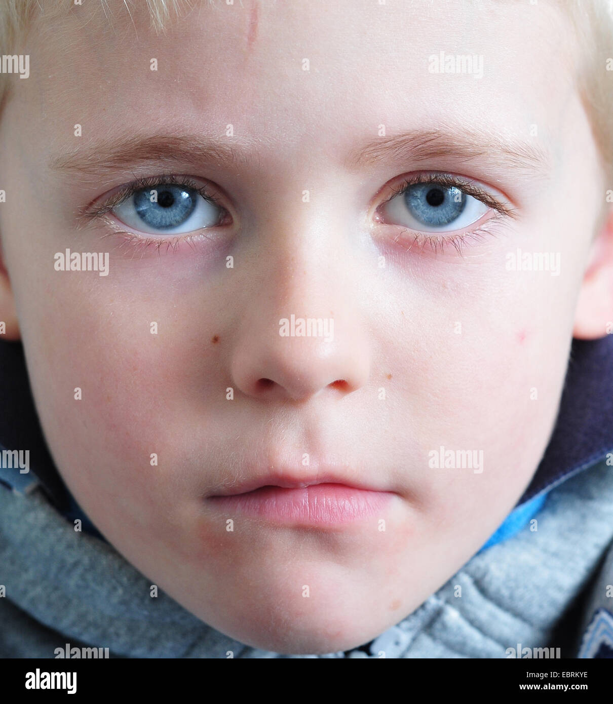 Blue eyed boy Stock Photo Alamy