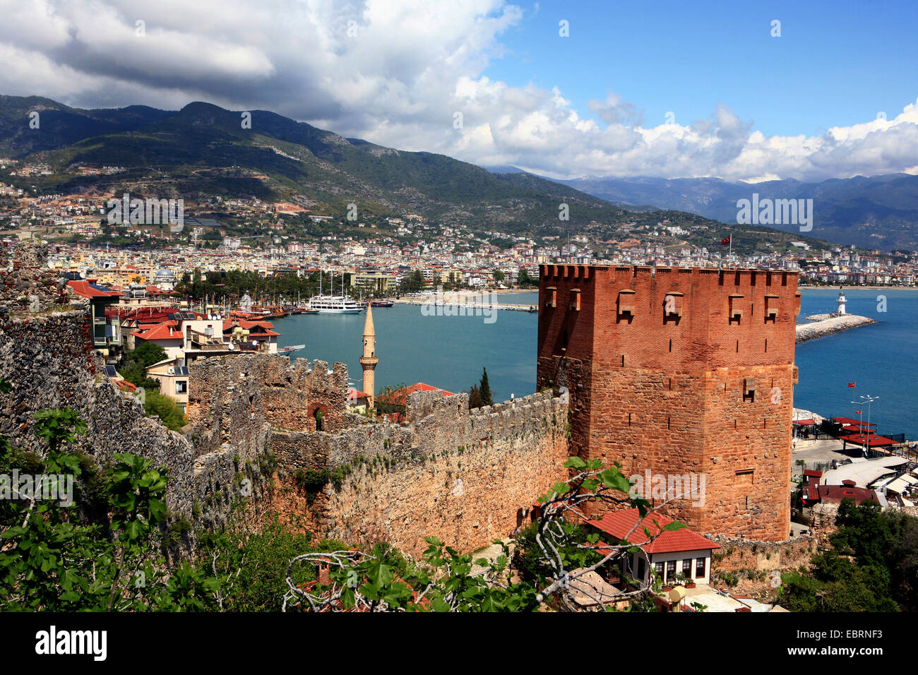 the Red Tower over the bay, built 1224 - 1228 to help protect the harbour, Turkey, Alanya Stock Photo