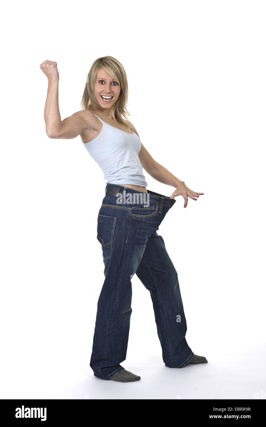 Full Body Young Woman Standing Happy Stock Photo by ©AsierRomeroCarballo  214573758