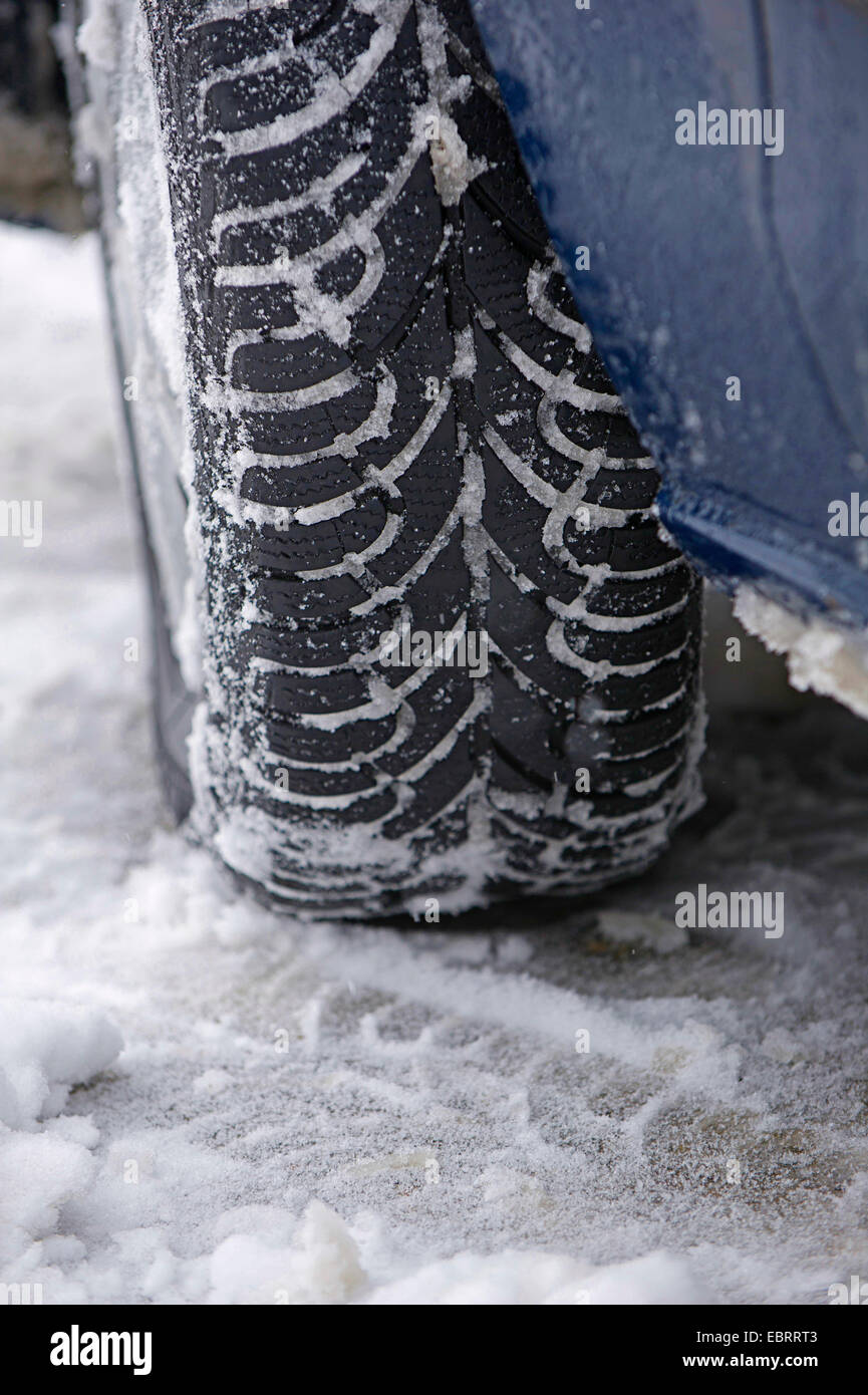 Winterreifen an einem PKW, snow tires at a car, Germany Stock Photo