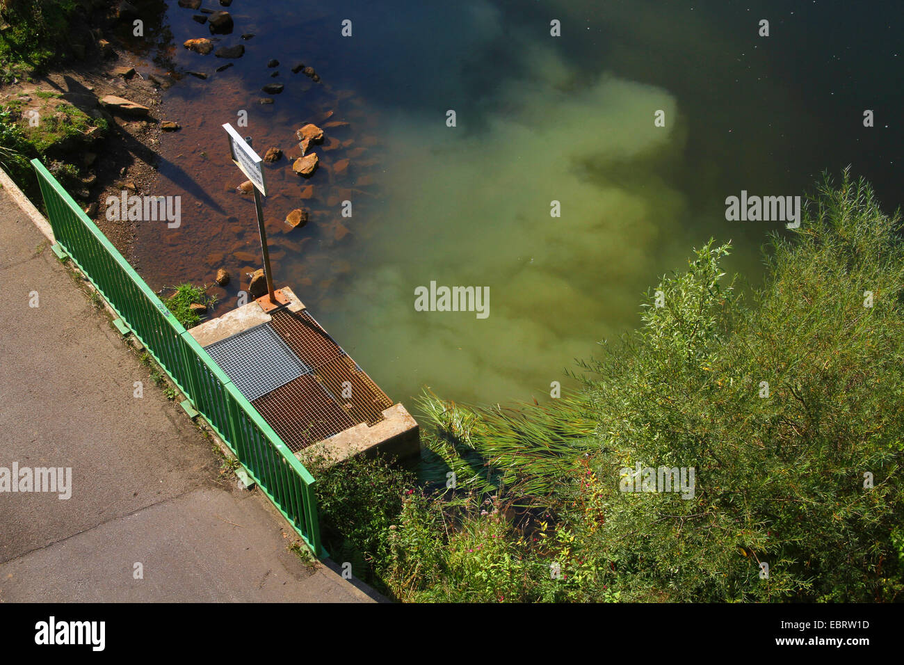 ferreous mine drainage water from the Zeche Heinrich running into the Ruhr, Germany, Nordrhein Westfalen, Ruhr Area, Essen Stock Photo