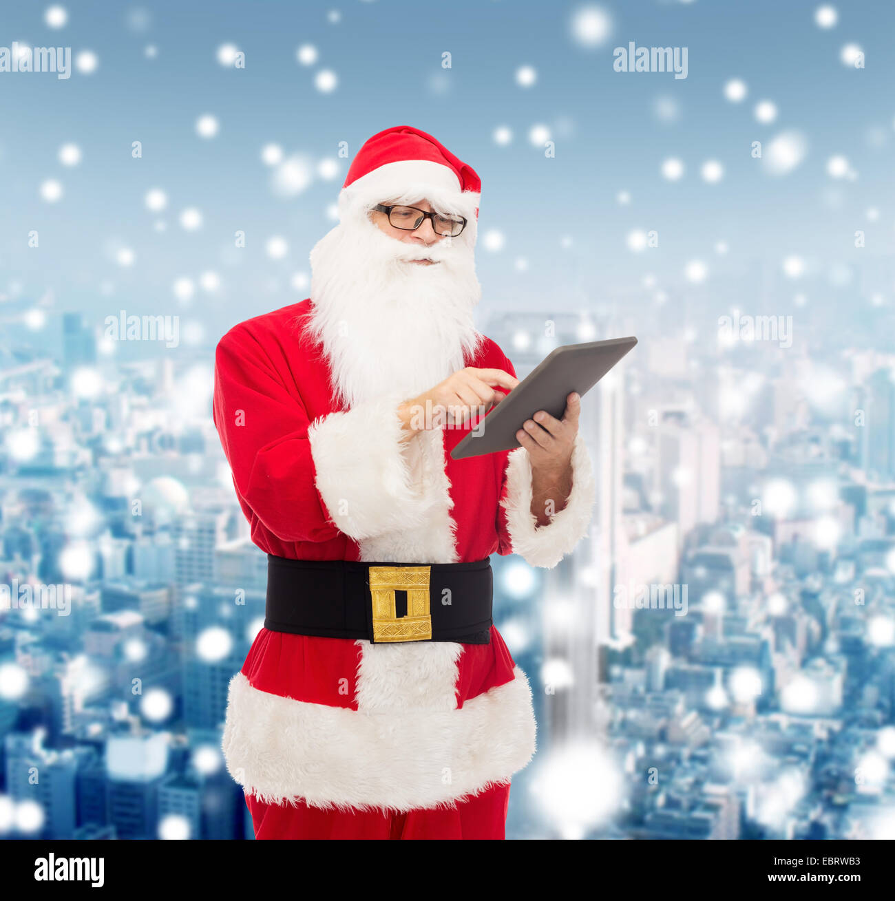 man in costume of santa claus with tablet pc Stock Photo - Alamy