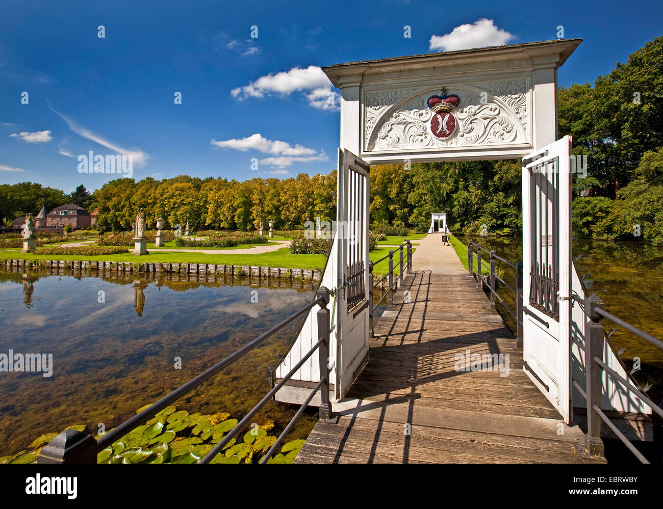 French formal garden of castle Anholt with gate, Germany, North Rhine-Westphalia, Muensterland, Isselburg-Anholt Stock Photo