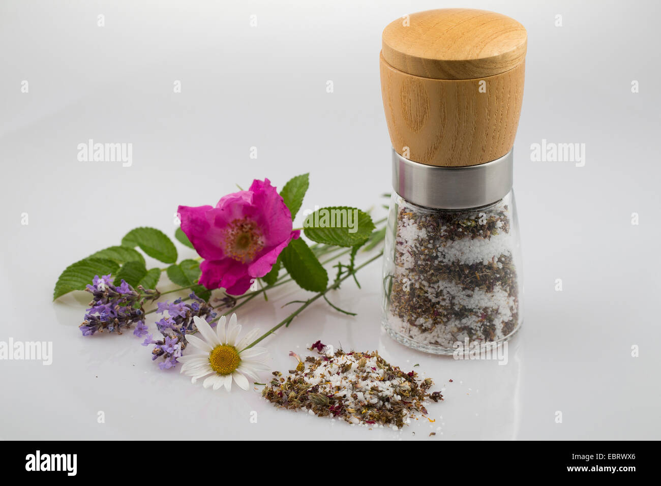 spice grinder with blossom salt, salt flavoured with eatable flowers Stock Photo