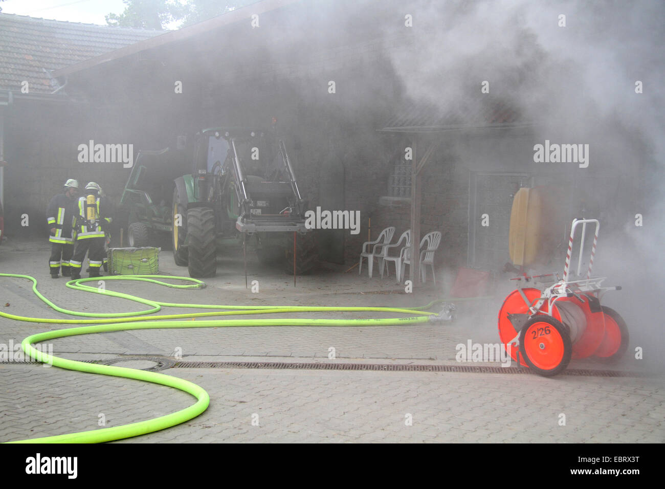 firefighting exercise on a farm, Germany Stock Photo