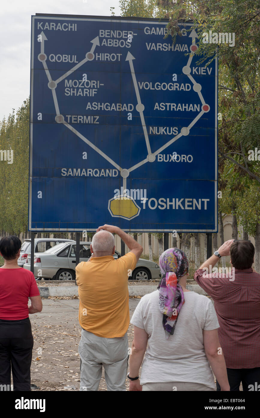 tourists in front of traffic sign, Tashkent, Uzbekistan, Asia Stock Photo