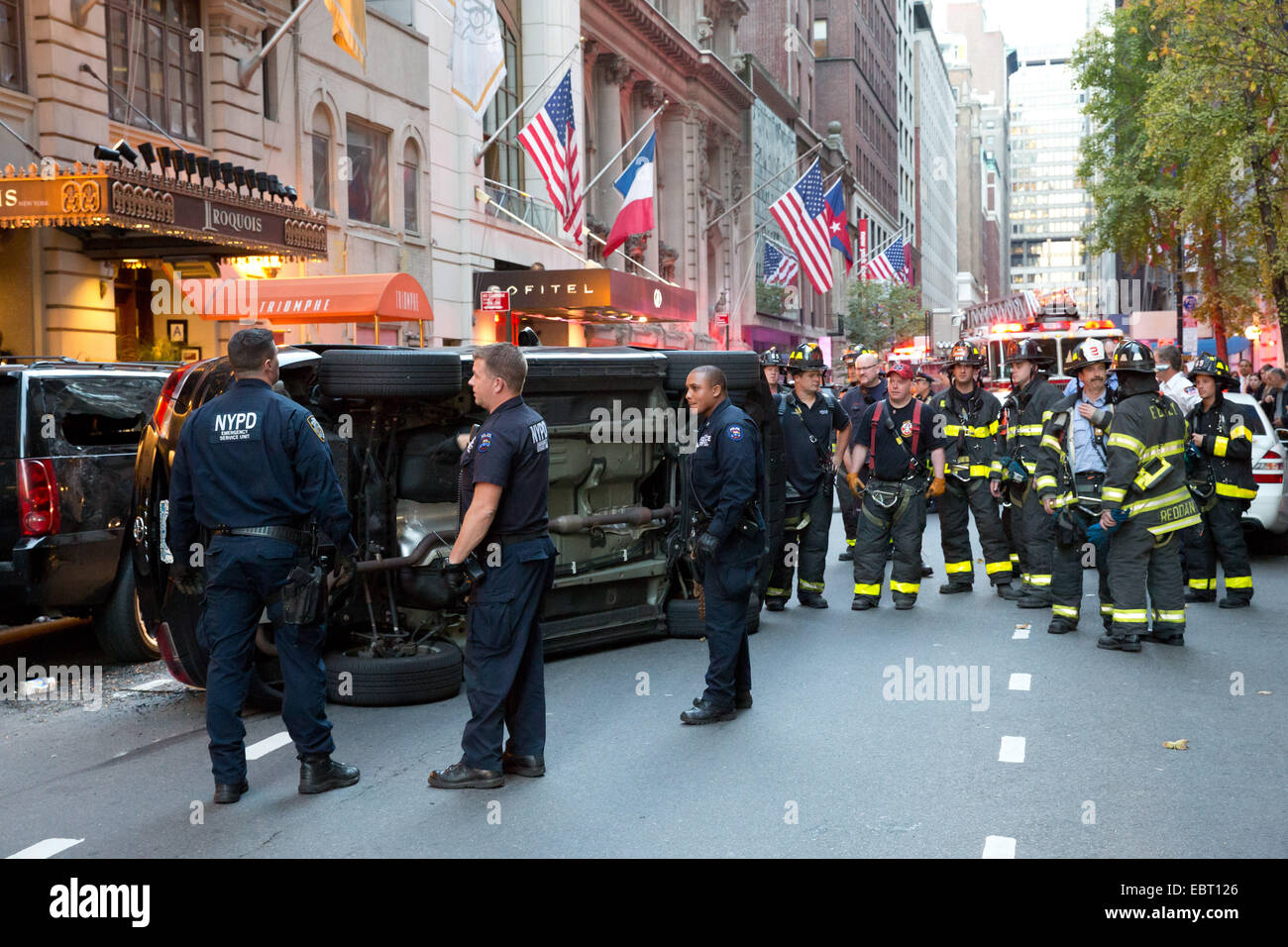 FDNY & NYPD on scene, rollover accident, W 44th St., Manhattan, Oct. 16, 2014. Stock Photo