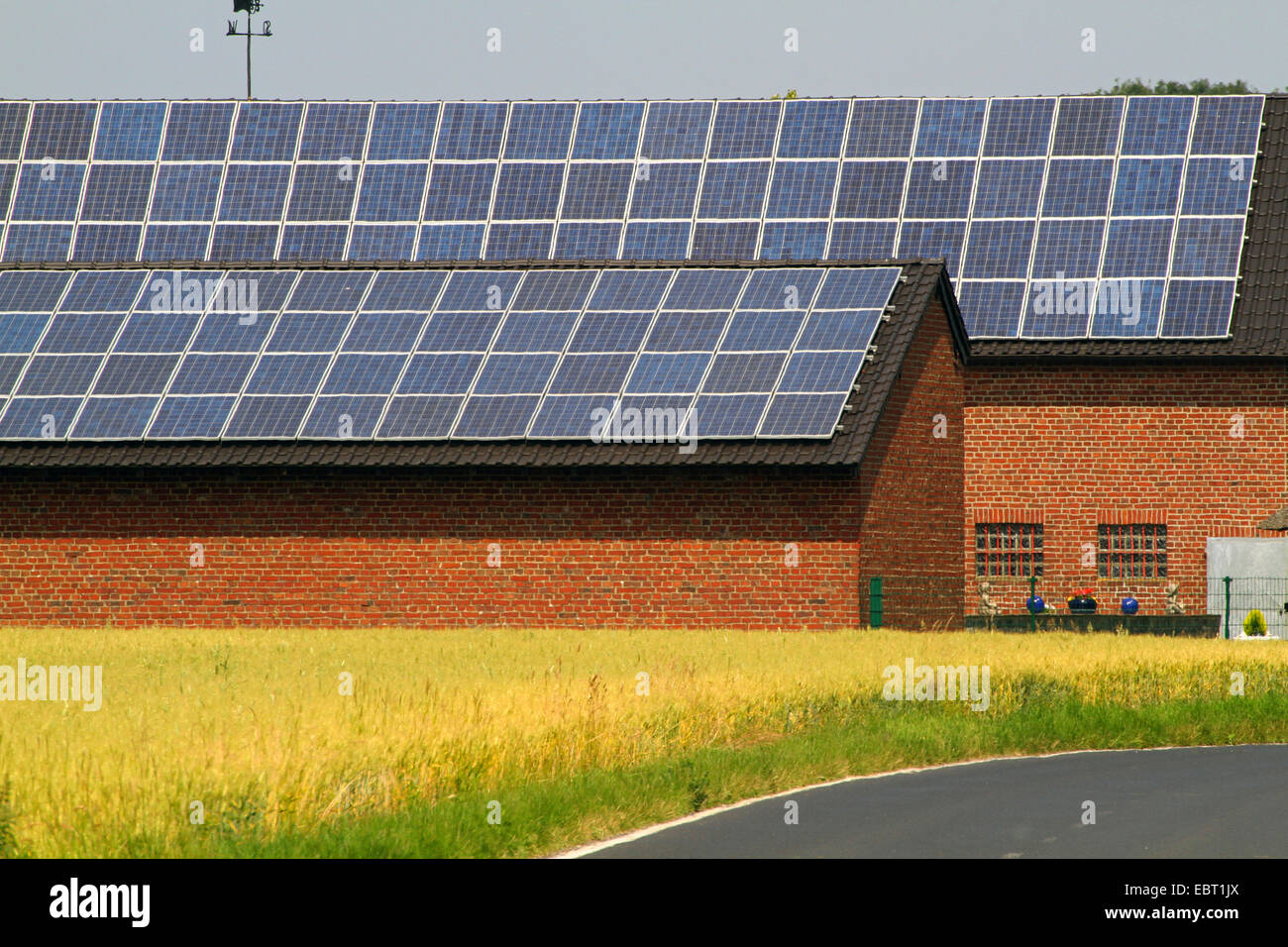 solar panels on the roof of a farmhouse Stock Photo