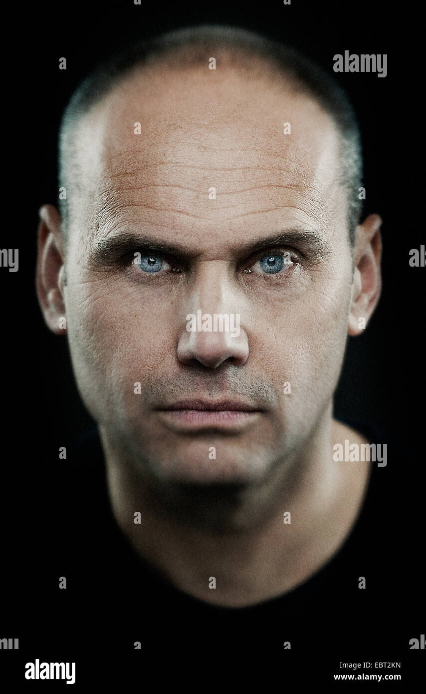 A portrait of a white European male age 50 shot in a studio Stock Photo