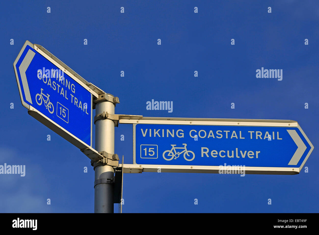 East Kent coast - Minnis Bay, England - Viking Coastal Trail signpost against a bright blue sky Stock Photo