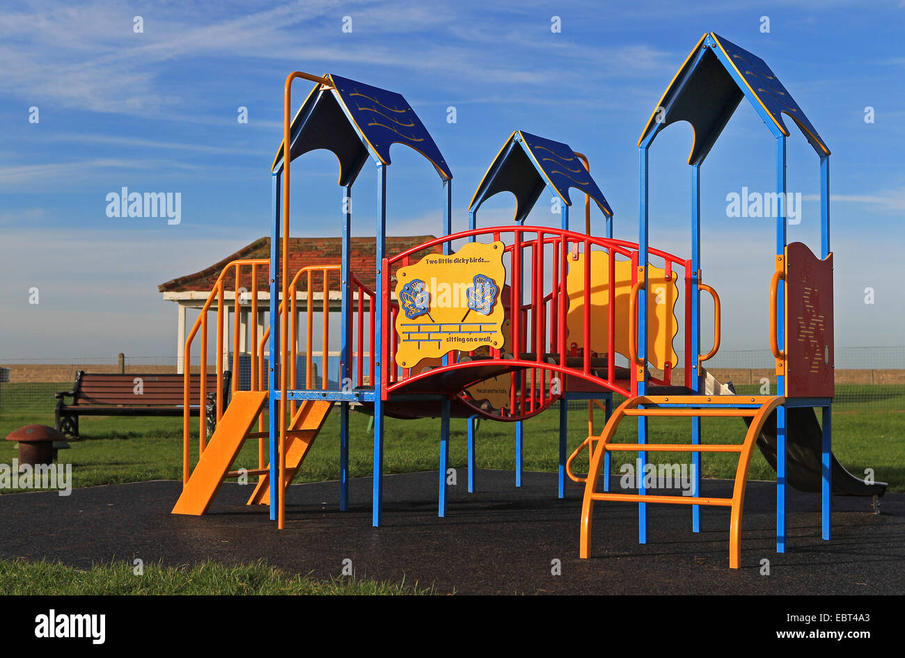 East Kent coast - Minnis Bay, England - colourful children's climbing frame in playground Stock Photo