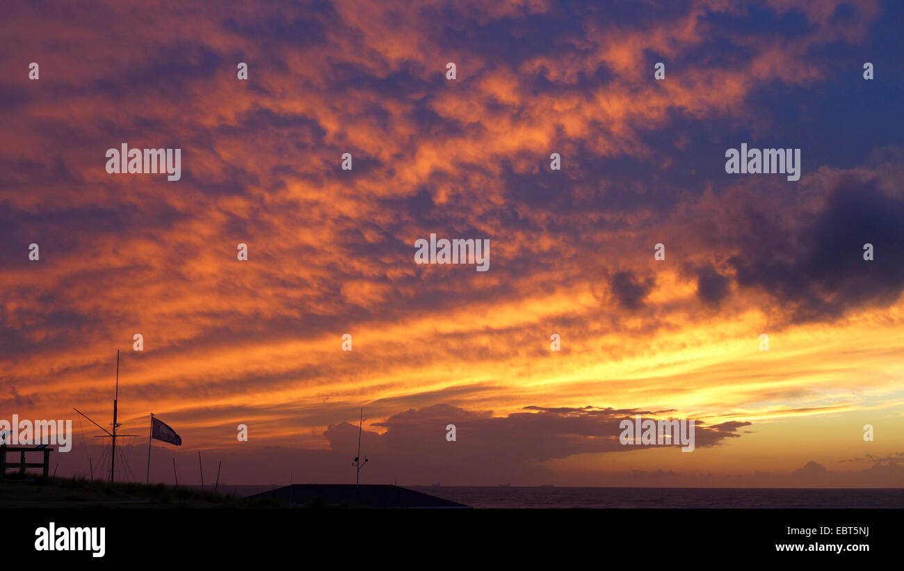 red evening sky at the North Sea Coast, Netherlands, South Holland, Noordwijk aan Zee Stock Photo