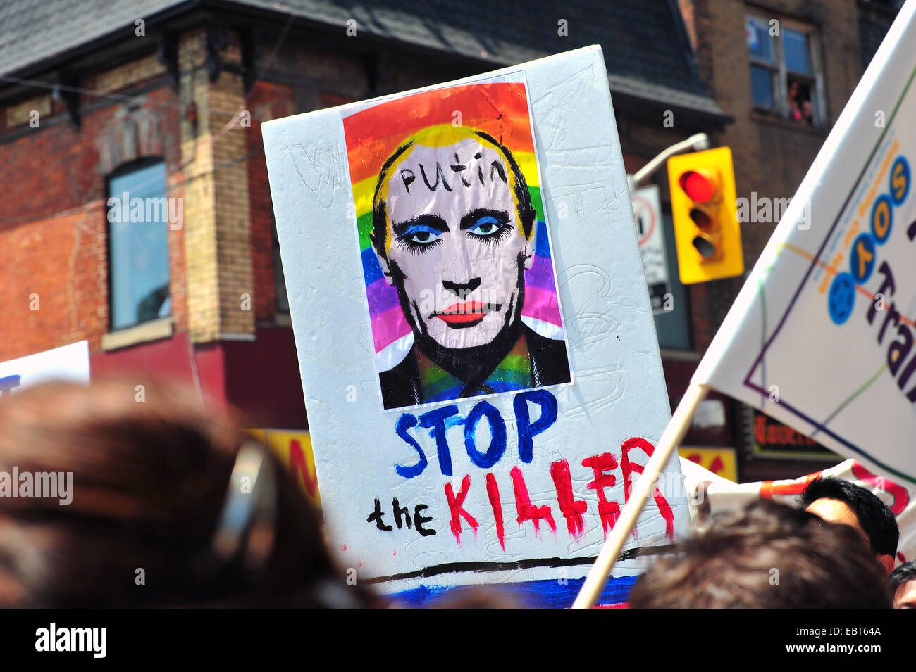 An anti Putin poster held up at the 2014 World Pride in Toronto. Stock Photo