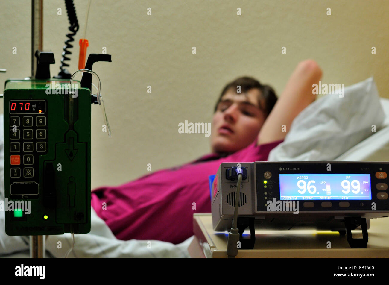 monitoring of teenage boy in a hospital Stock Photo