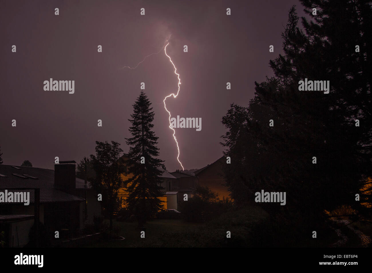 lightning strike in a housing area, Germany, Bavaria, Isental Stock Photo