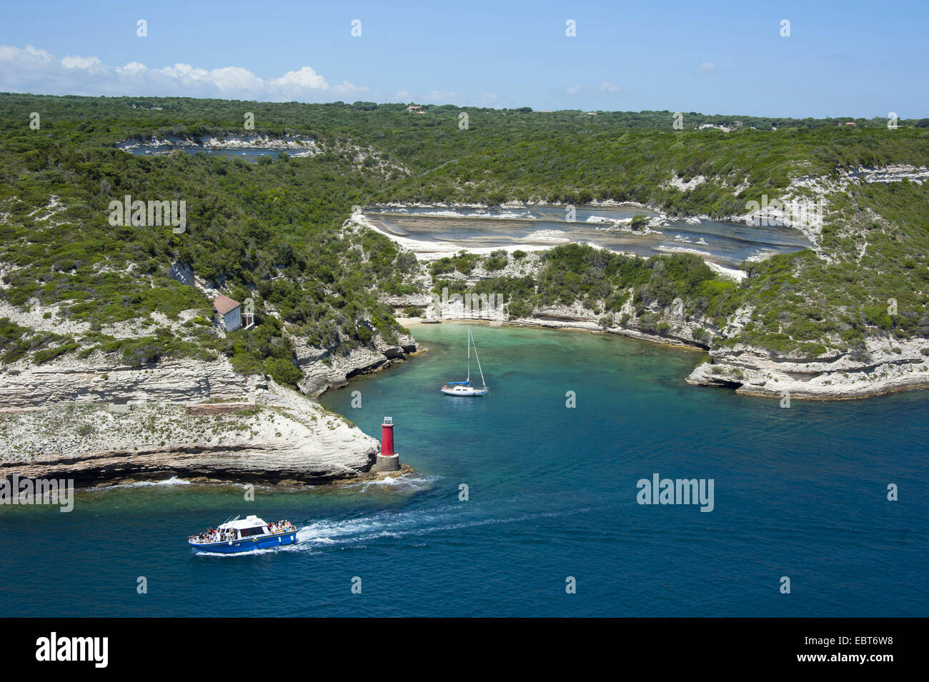 rocky coast, fjord and lighthouse, Goulet de Bonifacio, France, Corsica, Bonifacio Stock Photo