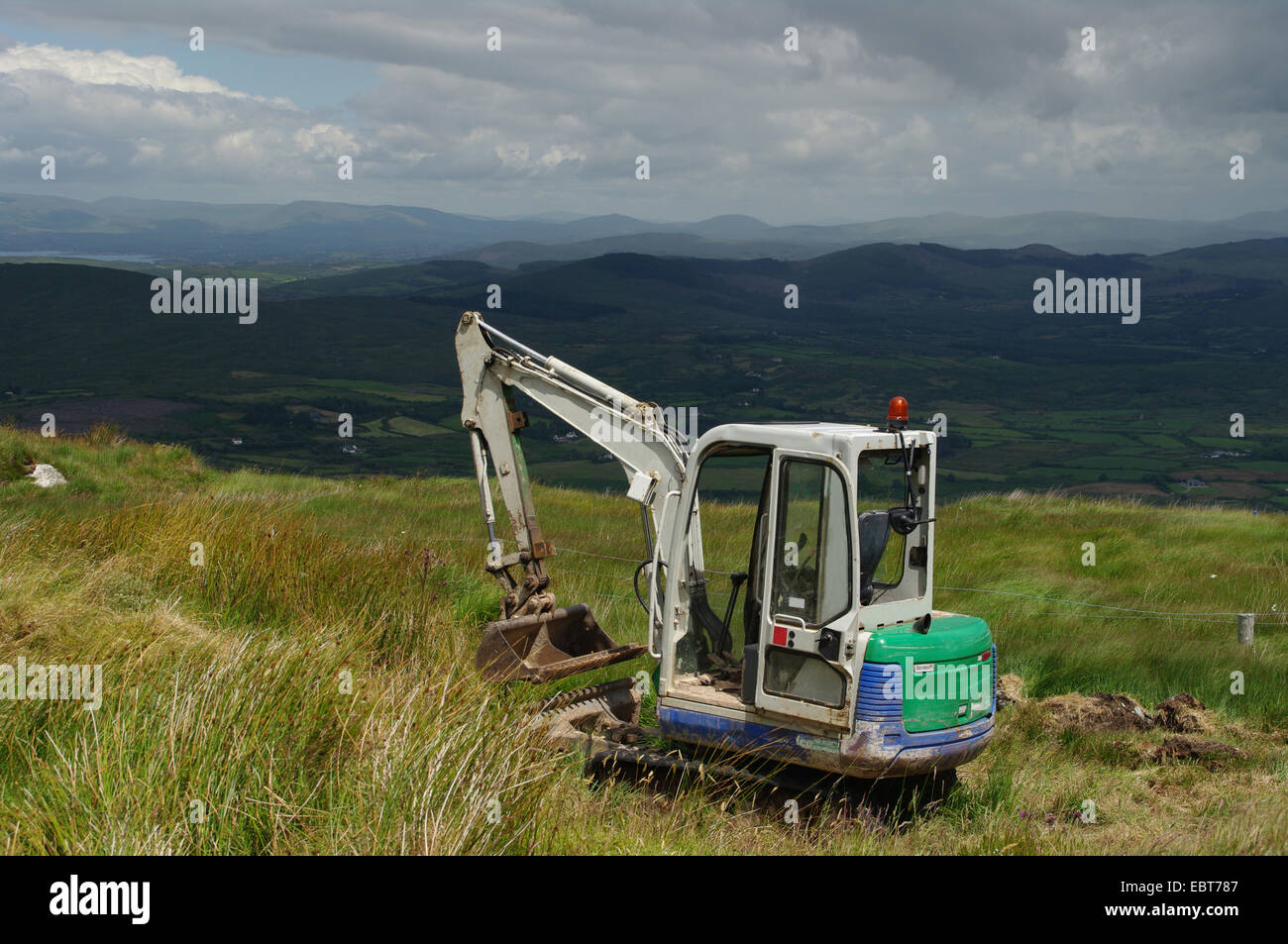 Mini Digger in the Mountains West Cork Stock Photo