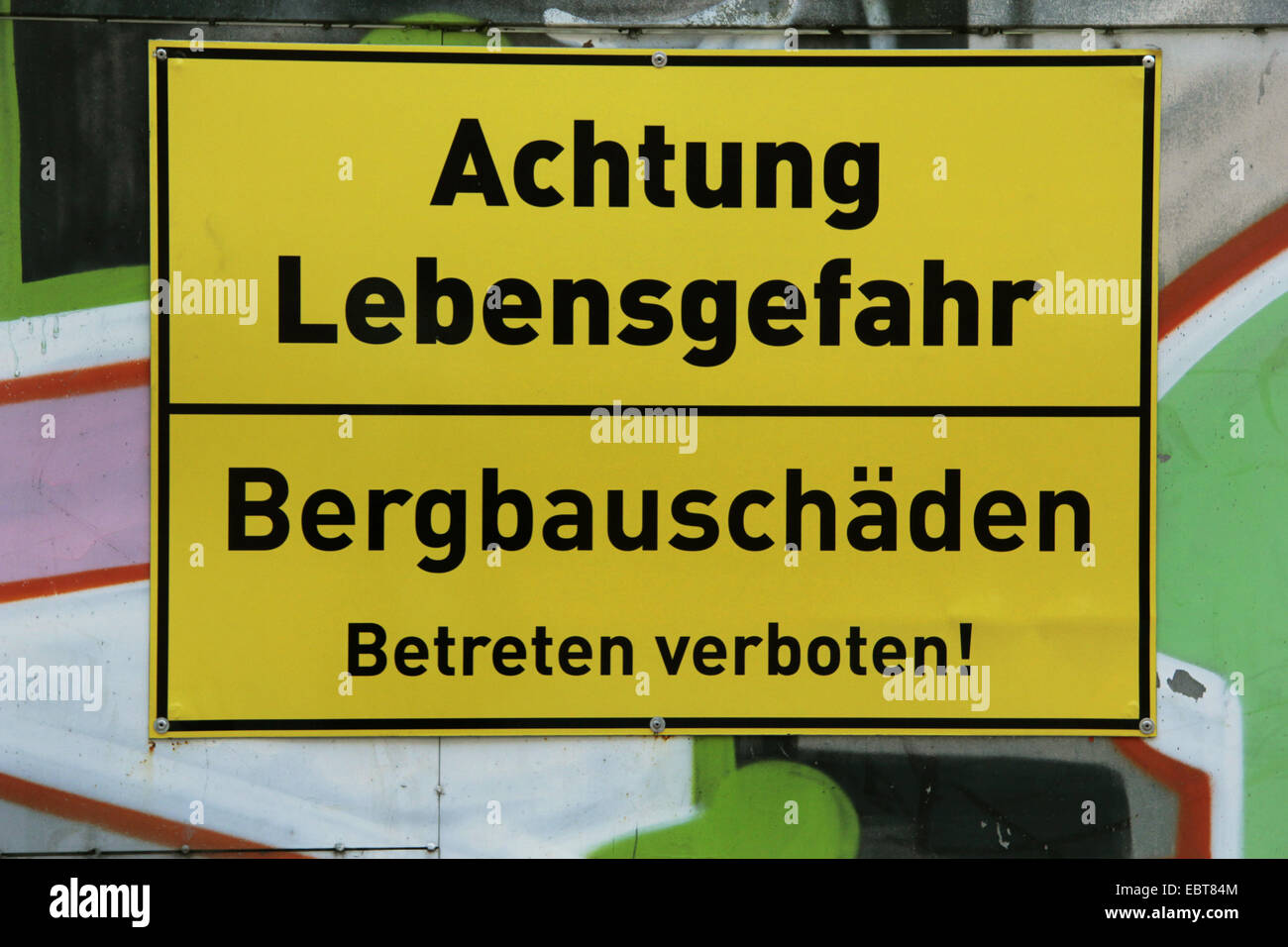 surface damages warning sign in Ruhr Area, Achtung Lebensgefahr, Bergbauschaeden. Betreten Verboten, Germany, North Rhine-Westphalia, Ruhr Area, Witten Stock Photo