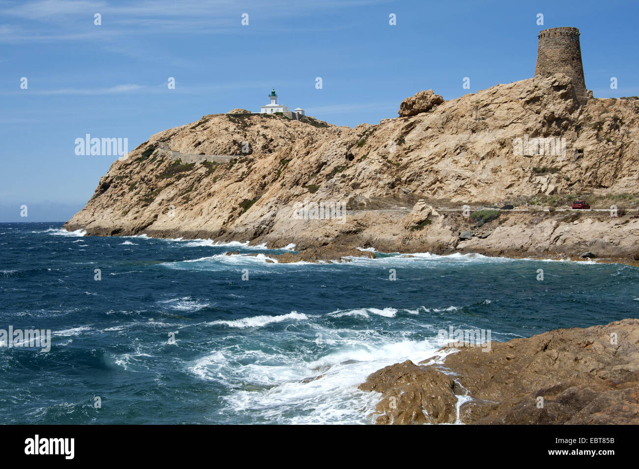 lighthouse on rocky island, France, Corsica, L' Ile-Rousse, Ile de la Pietra Stock Photo