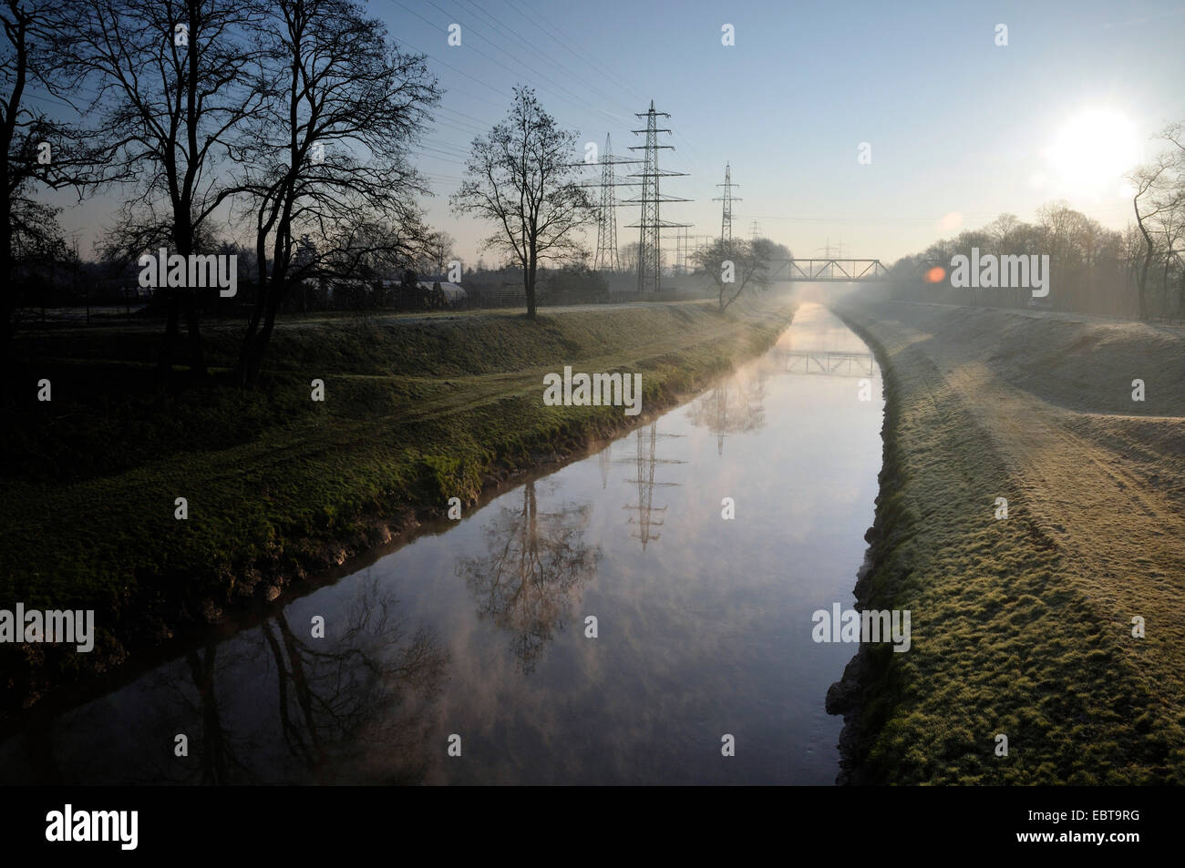 canalised Emscher river in the morning, Germany, North Rhine-Westphalia, Ruhr Area, Oberhausen Stock Photo