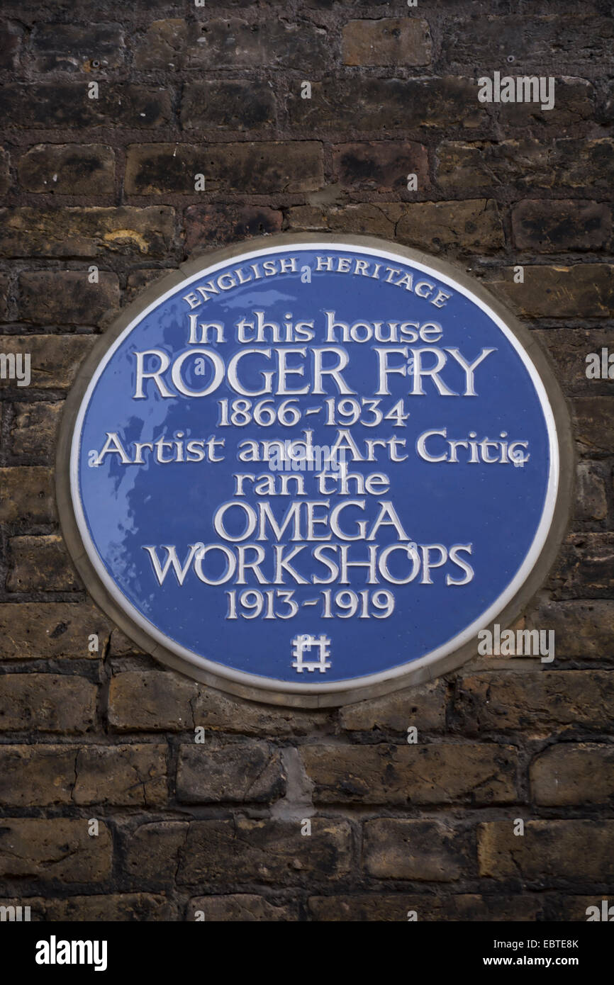 english heritage blue plaque marking the site of artist roger fry's omega workshops, fitzroy square, london, england Stock Photo