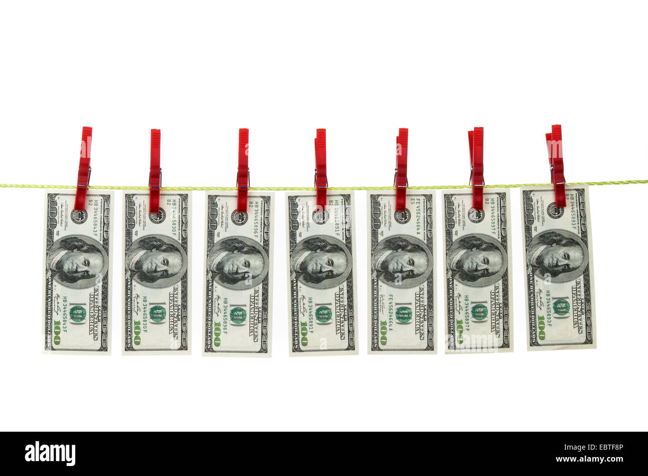 100 Dollar bills on the clothesline symbolising 'money laundering', USA Stock Photo