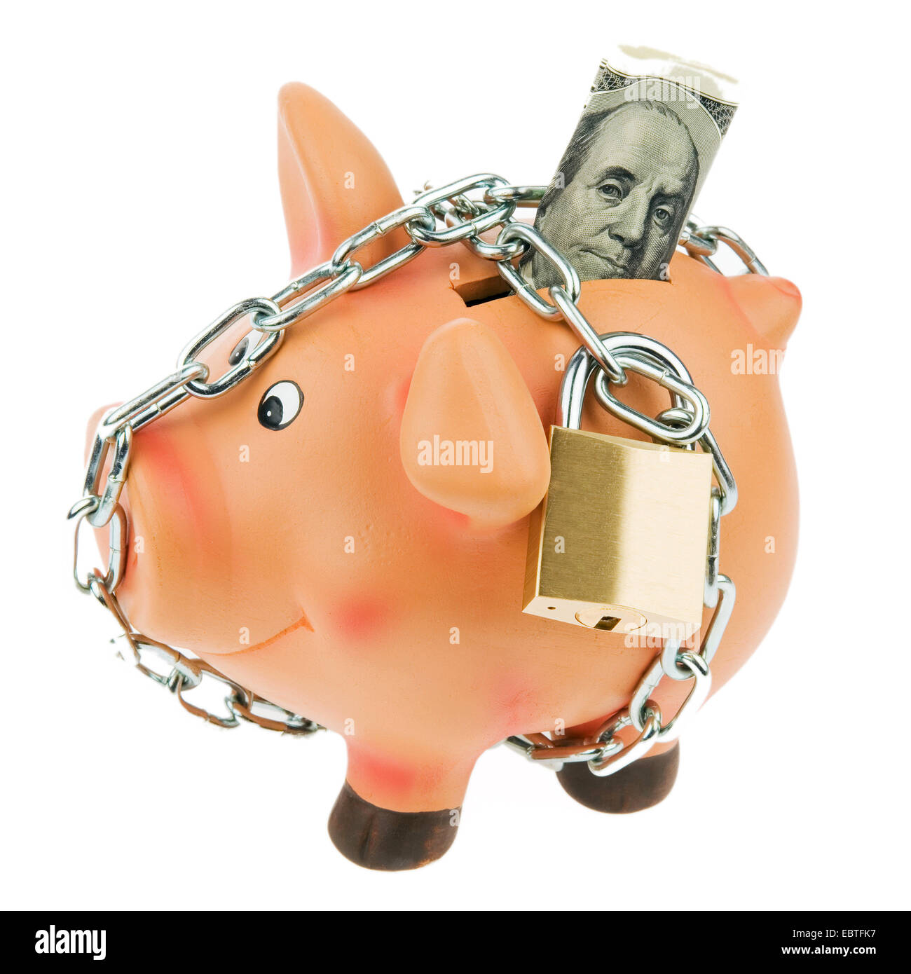 piggybank with Dollar bill protected with chain and lock Stock Photo