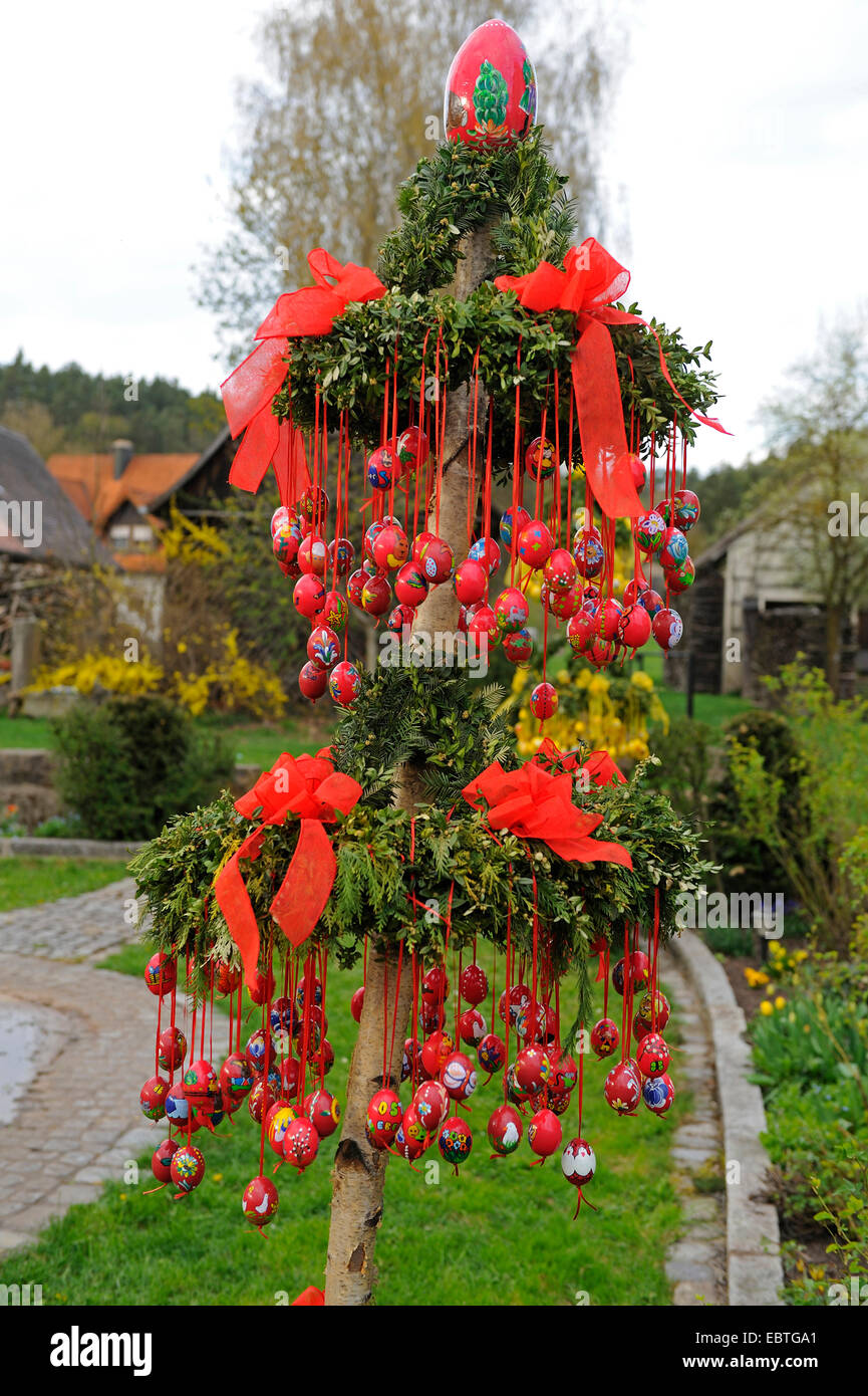 flower arrangement in a park decorated with Easter eggs, Germany, Bavaria, Franken, Franconia Stock Photo