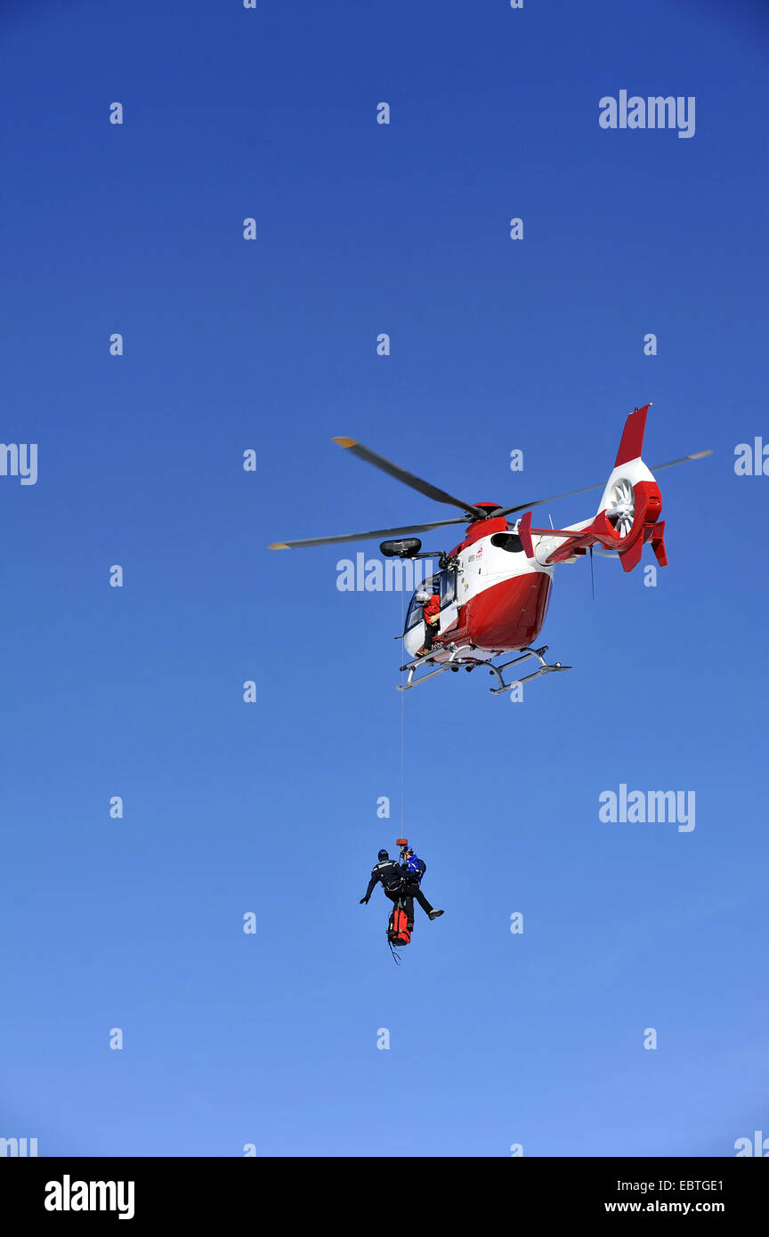 air ambulance with a rescue helicopter, France, Savoie, Courchevel Stock Photo