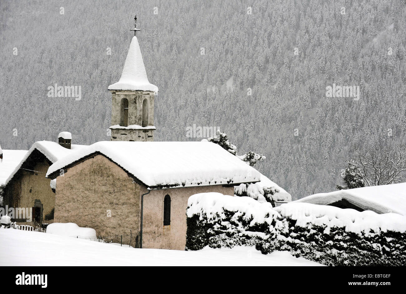 church in snowy landscape, France, Savoie, Seez Stock Photo