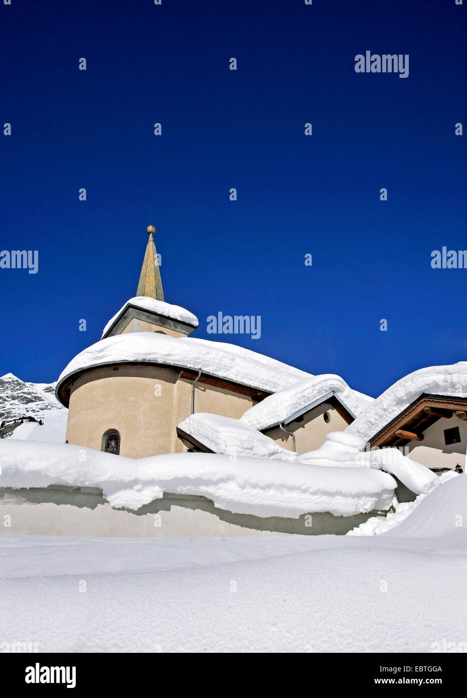 snow covered church, France, Savoie, Champagny en Vanoise Stock Photo