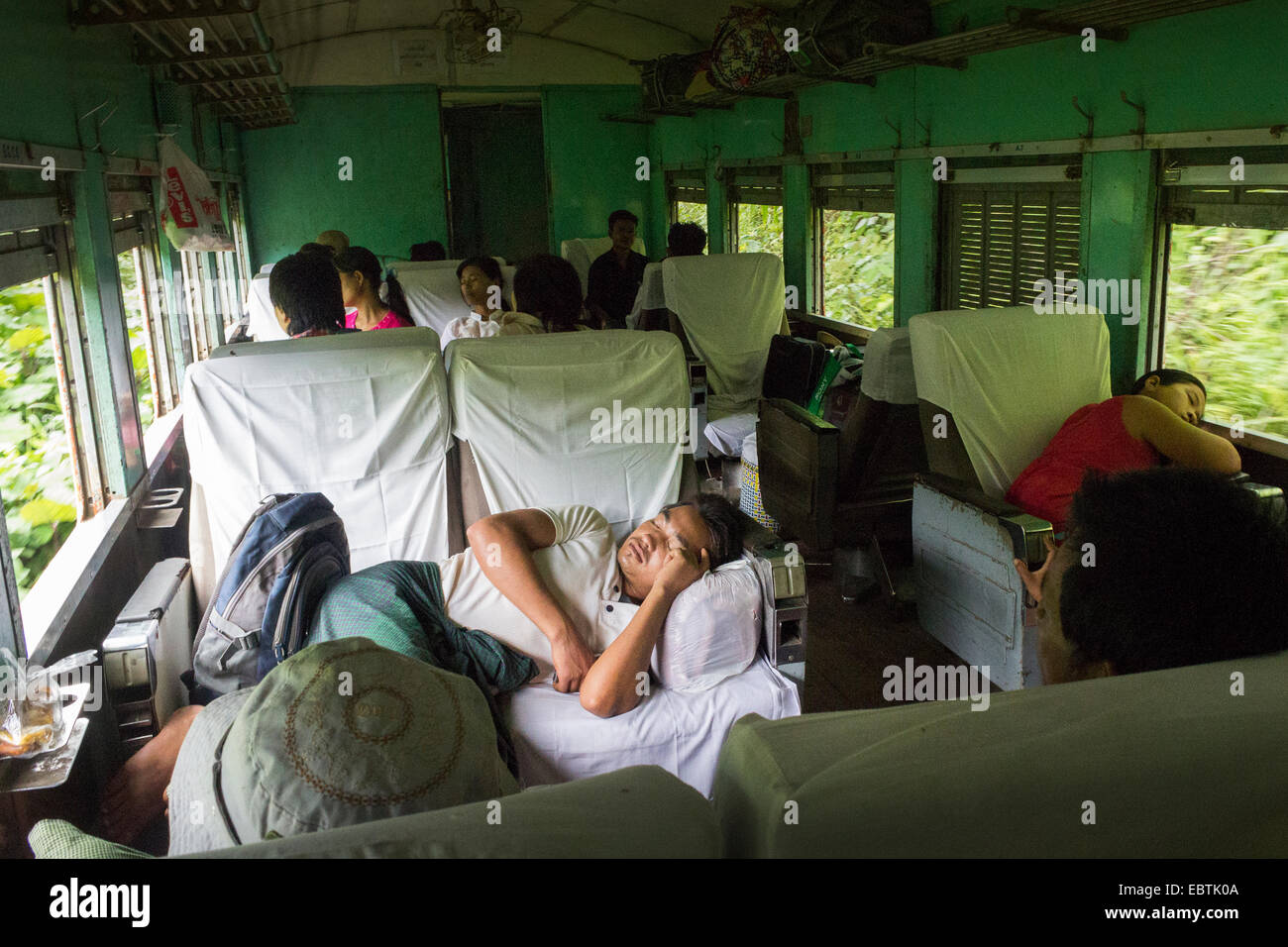 People sleeping on train hi-res stock photography and images - Alamy