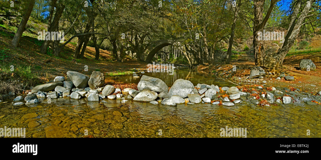 A panoramic view of the Kelefos Bridge in Autumn with a bolder dam spanning the small river Stock Photo