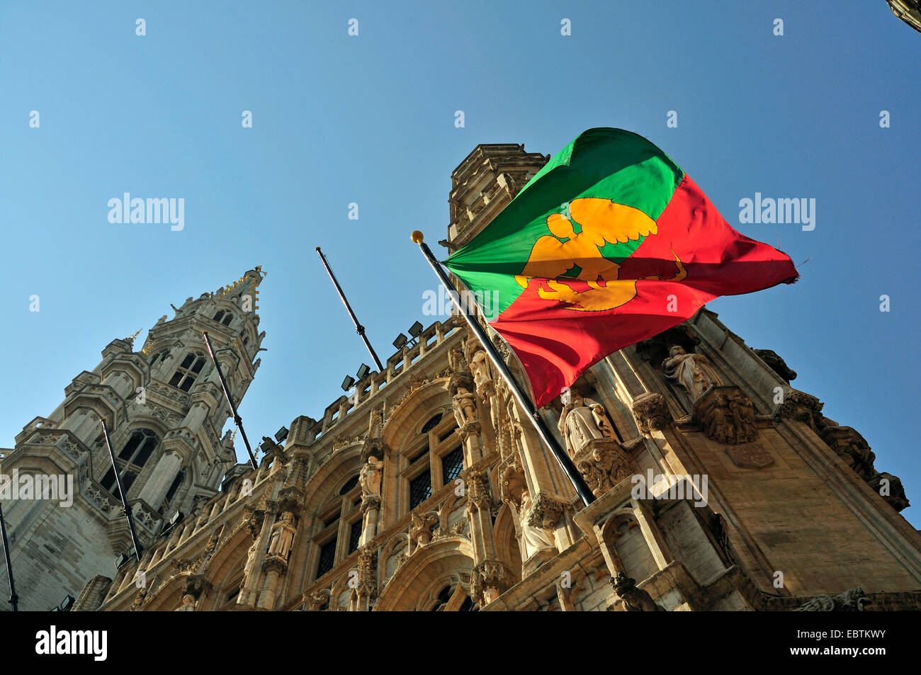 flag of Brussels at the facade of gothic town hall at Grand Place, Belgium, Brussels Stock Photo