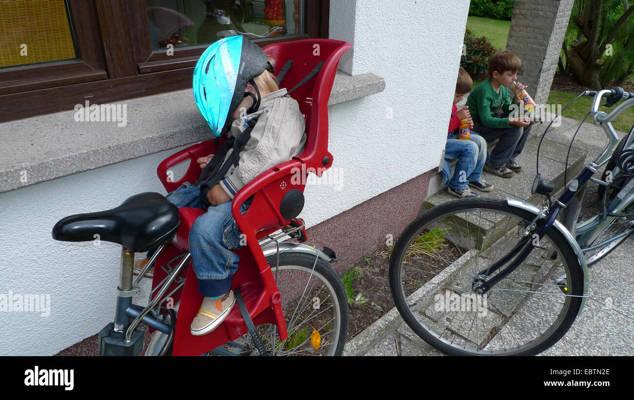 Baby sleeping in bike clearance seat