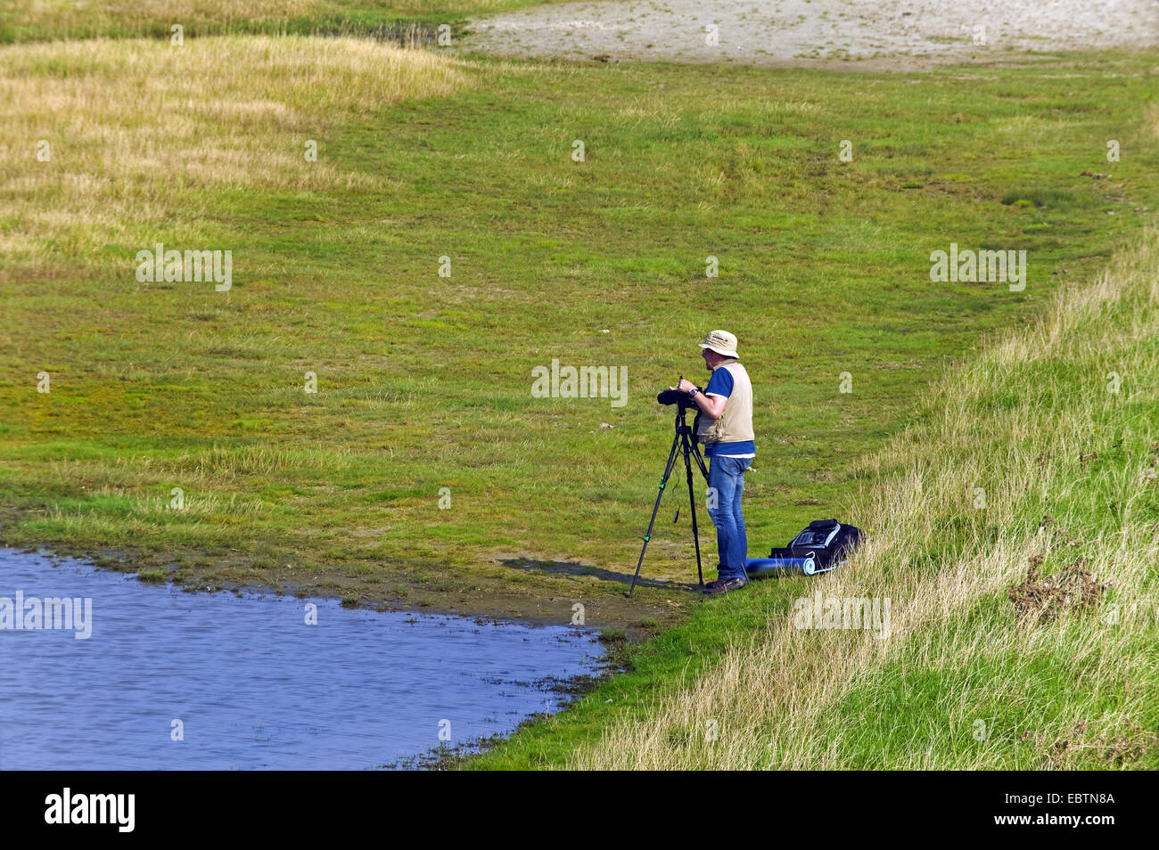 photographer in the saltmarshes of Schillig, Germany, Lower Saxony, Frisia Stock Photo