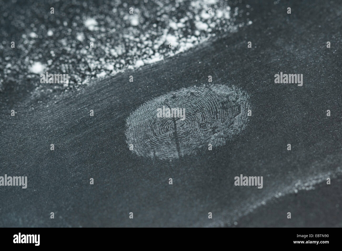 taking fingerprints. 3 step: powder is removed with a brush, finger-print becomes visible Stock Photo