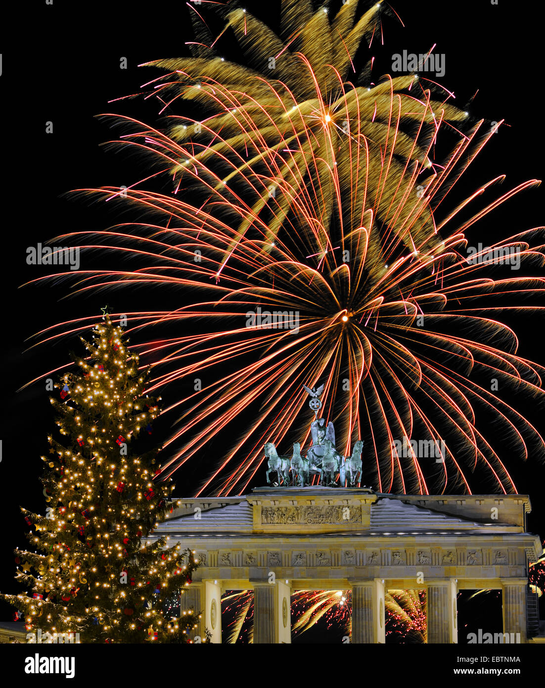 fireworks at Brandenburg Gate with christmas tree, Germany, Berlin