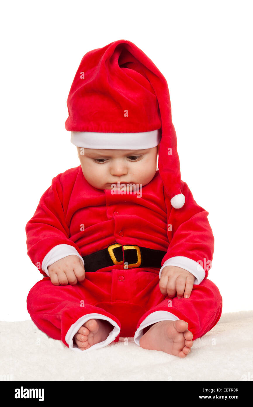 baby dressed as Santa Claus Stock Photo