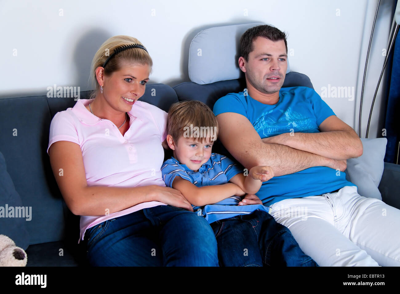 family watching TV Stock Photo
