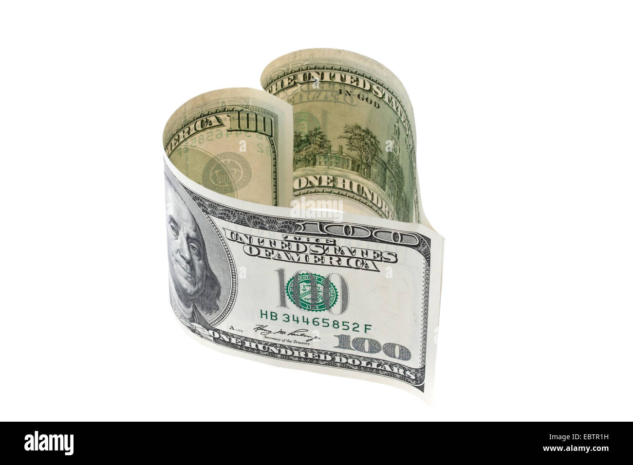 100 Dollar bill in heart shape Stock Photo
