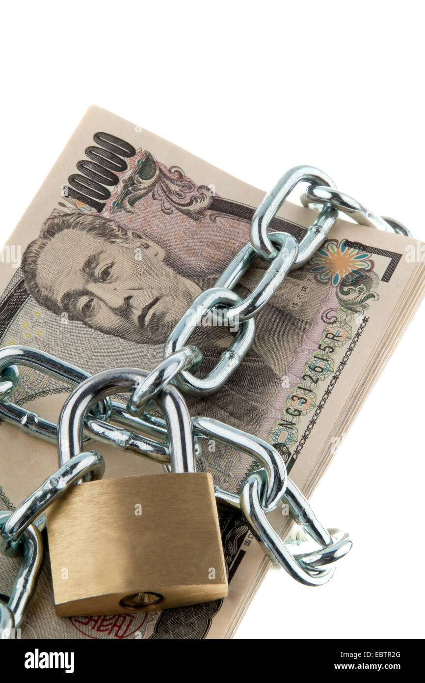 yen notes with lock and chain, Japan Stock Photo