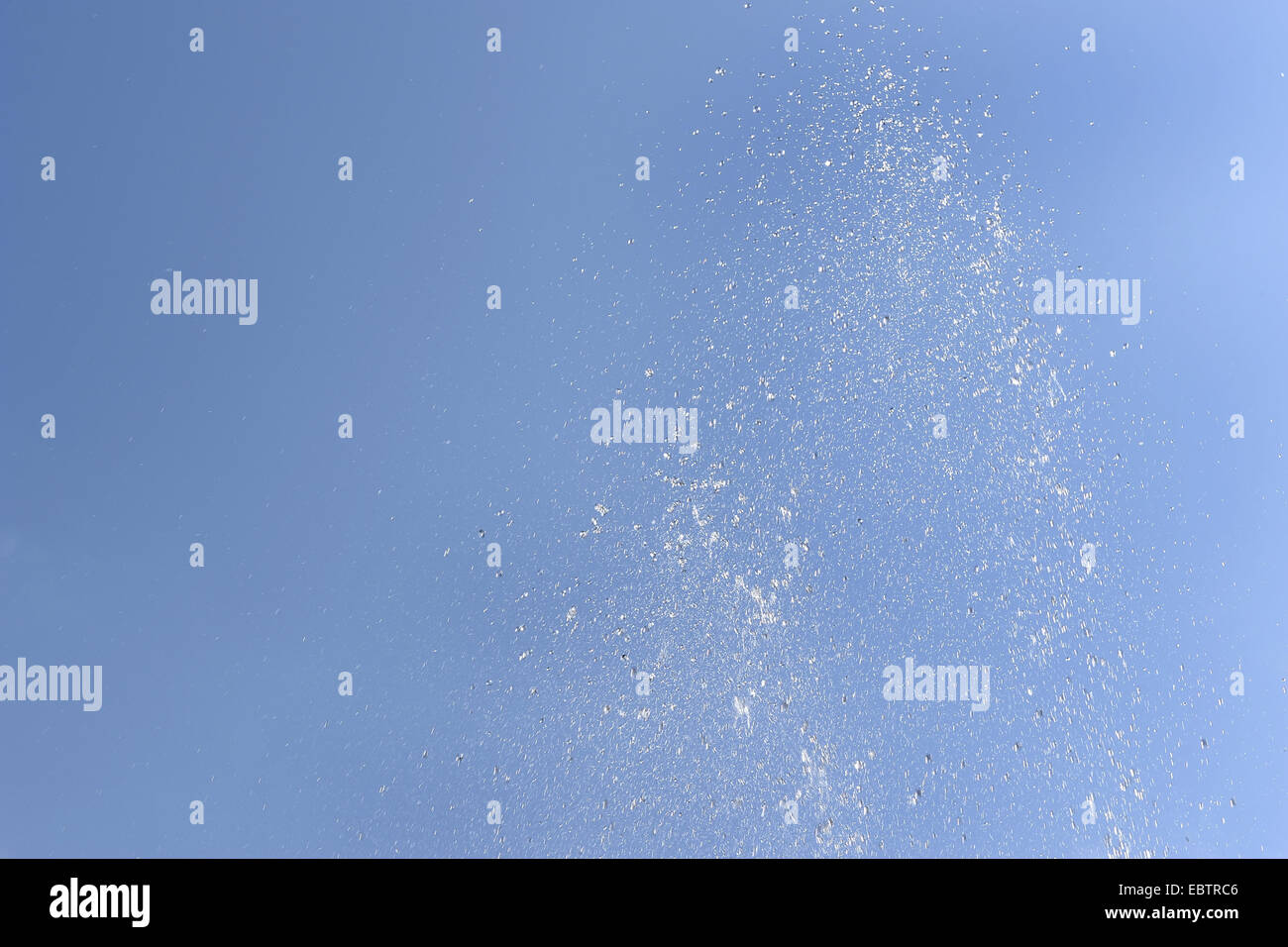 blue sky and drops of water column, Germany, Bavaria Stock Photo