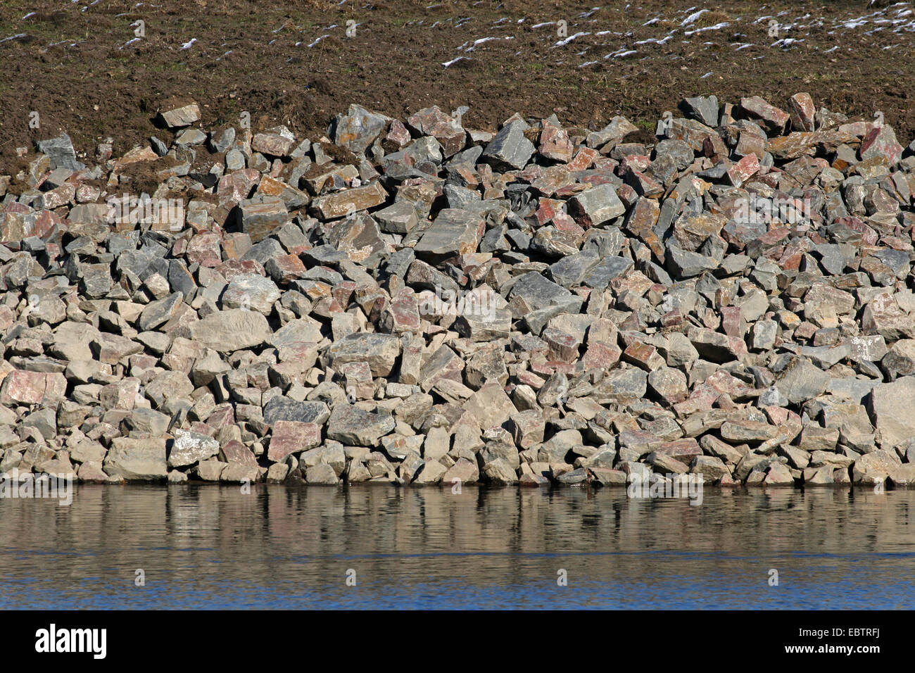 shoreline stabilisation with pieces of rock, Germany, North Rhine-Westphalia, Ruhr Area, Essen Stock Photo